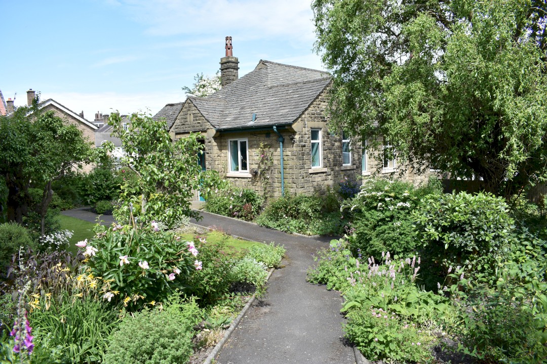 Keighley Quaker Meeting House from the upper gate in summer..